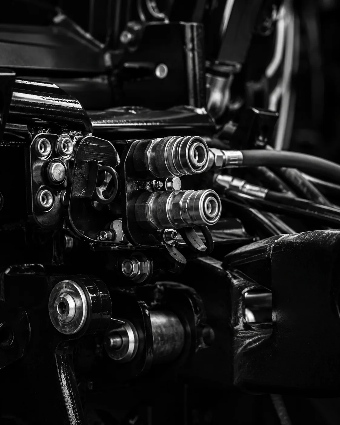 Agricultural machinery in black-and-white close-up