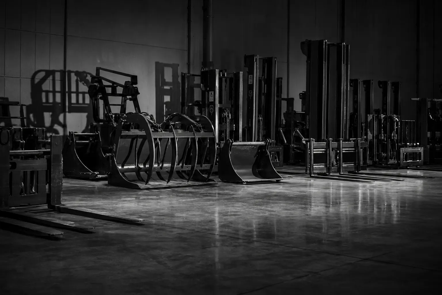 Heavy machinery under dramatic industrial lighting